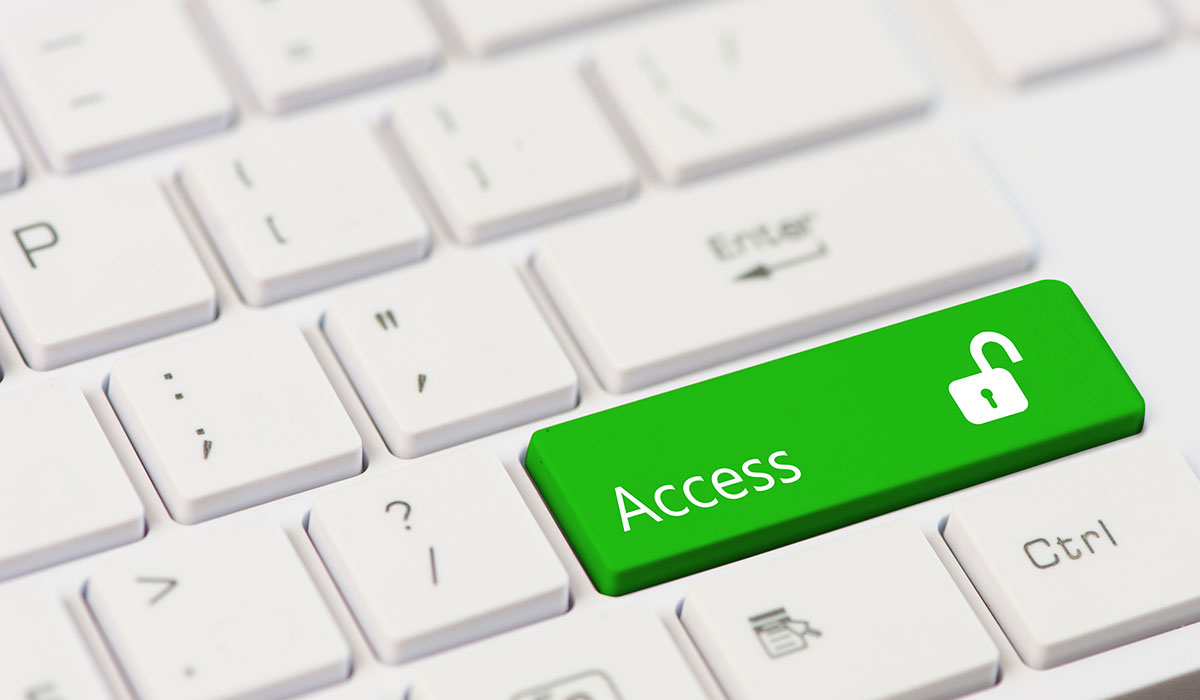 A white keyboard shows a large green 'Access' key in place of the 'Enter' key. Next to the word 'Access' on the key is an unlocked padlock.